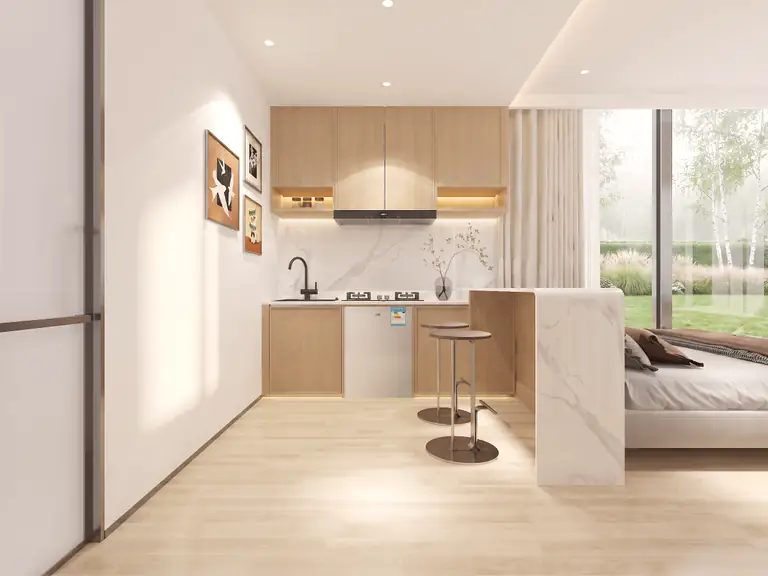 Capsule kitchen with a marble bar counter, two stools and oak fronts